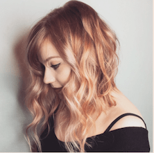 Blonde wavy hairstyle seen from the side